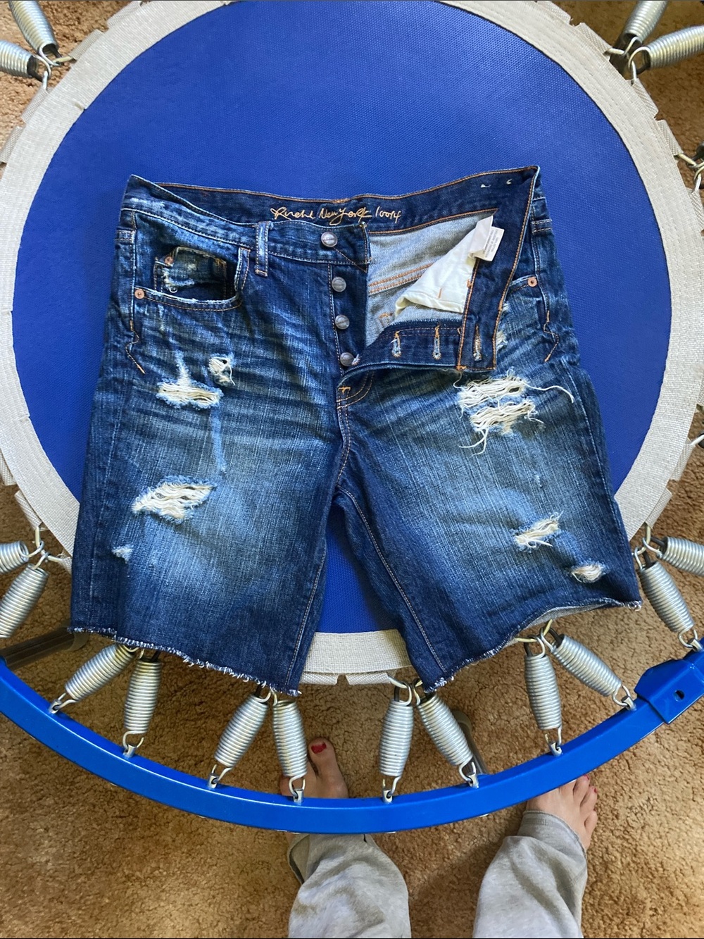 New without tags, distressed, medium length jean shorts